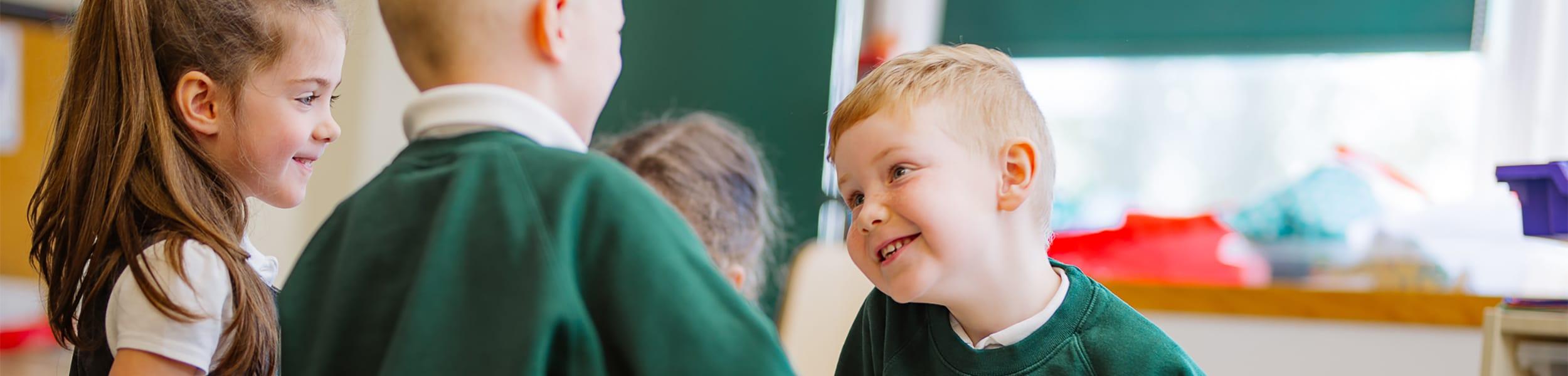 children smiling and talking